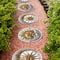 Glitzhome® 10" Cement Sun & Moon Textured Stepping Stones Set